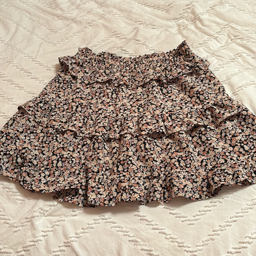 Black floral ruffle skirt.